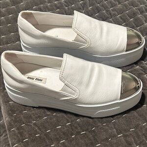 Miu Miu White Slip-On Loafers with Silver Toe